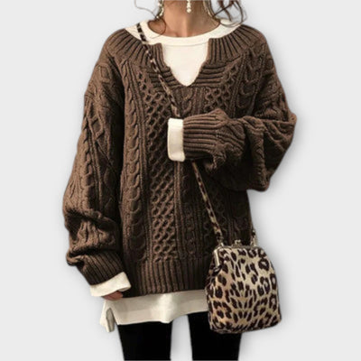 Oversized knitted sweater with cable pattern